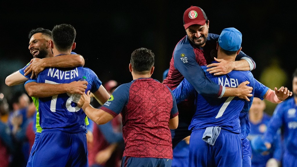 Afghanistan players celebrate after defeating Australia by 21 runs in their men's T20 World Cup cricket match at Arnos Vale Ground, Kingstown, Saint Vincent and the Grenadines, Saturday, June 22, 2024. (AP Photo/Ramon Espinosa)